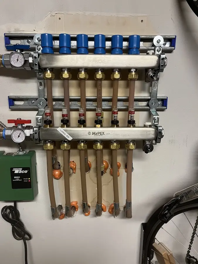 Plumber performing Water Heater Repair at a residential property in Grand Junction